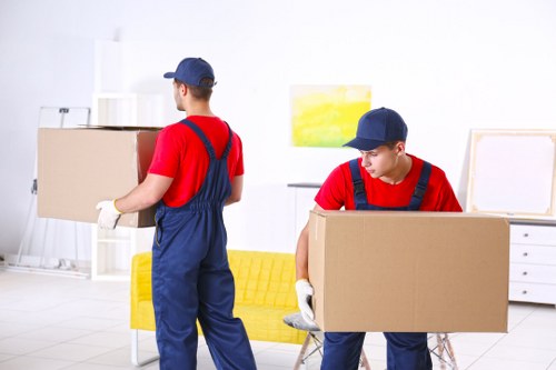 Removal team planning a move in a busy Soho street