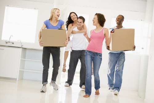 Business relocation planning in Soho with moving boxes and office furniture