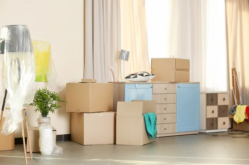 Professional home move planning in Soho with boxes and furniture ready for loading
