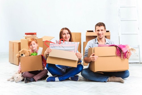 Business relocation team handling office furniture in central London