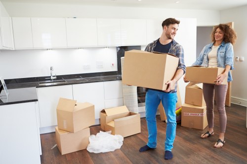 Office removal boxes and furniture prepared for transport in Soho