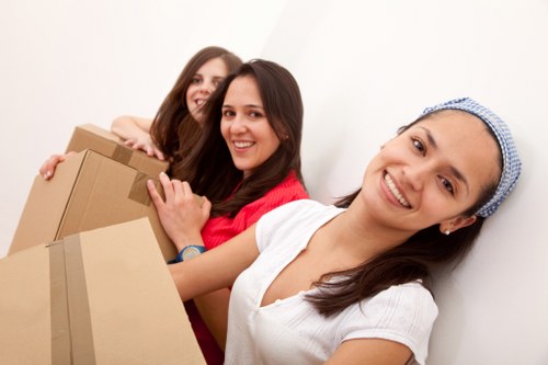 Unpacking household items in a Soho flat after relocation