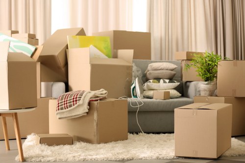 Professional movers handling office equipment in Soho