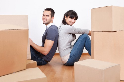 Local movers handling fragile items in a Soho building